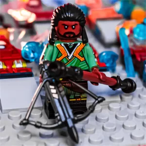 Minifigure - Karl Mordo in his green robes, equipped with a staff and crossbow​​ (LEGO Alternative)