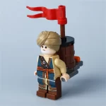 Minifigure – medieval character carrying a device on its back (LEGO Alternative)