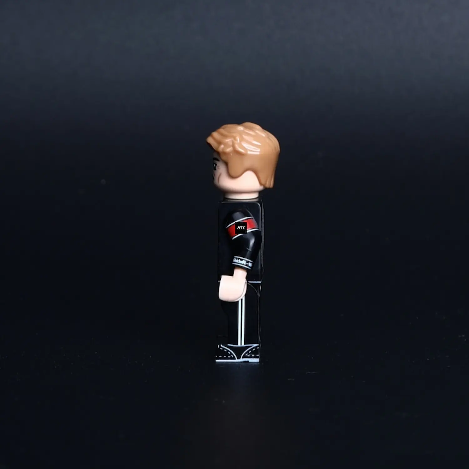 the left side of Minifigure - high-ranking officer of the German Schutzstaffel (SS), depicted in a formal evening dress uniform from the World War II (LEGO Compatible)