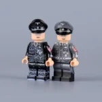 Minifigure - Reinhard Heydrich, a high-ranking SS and police general and a principal architect of the Holocaust during World War II, shown in two different uniforms (LEGO Compatible)
