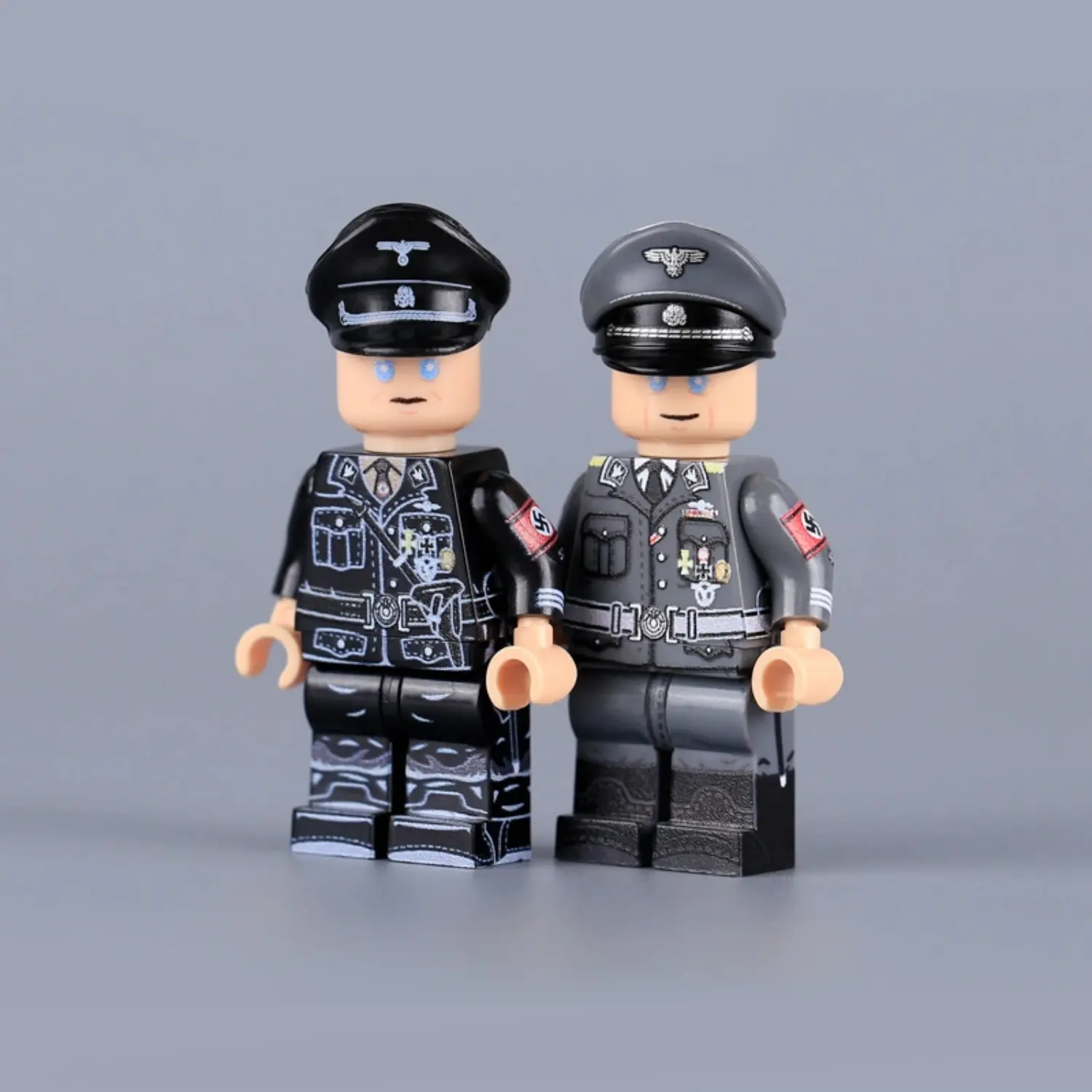 Minifigure - Reinhard Heydrich, a high-ranking SS and police general and a principal architect of the Holocaust during World War II, shown in two different uniforms (LEGO Compatible)