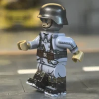 the left side of the Minifigure - German Anti-Aircraft Artillery Soldier (Winter) WWII (LEGO Compatible)