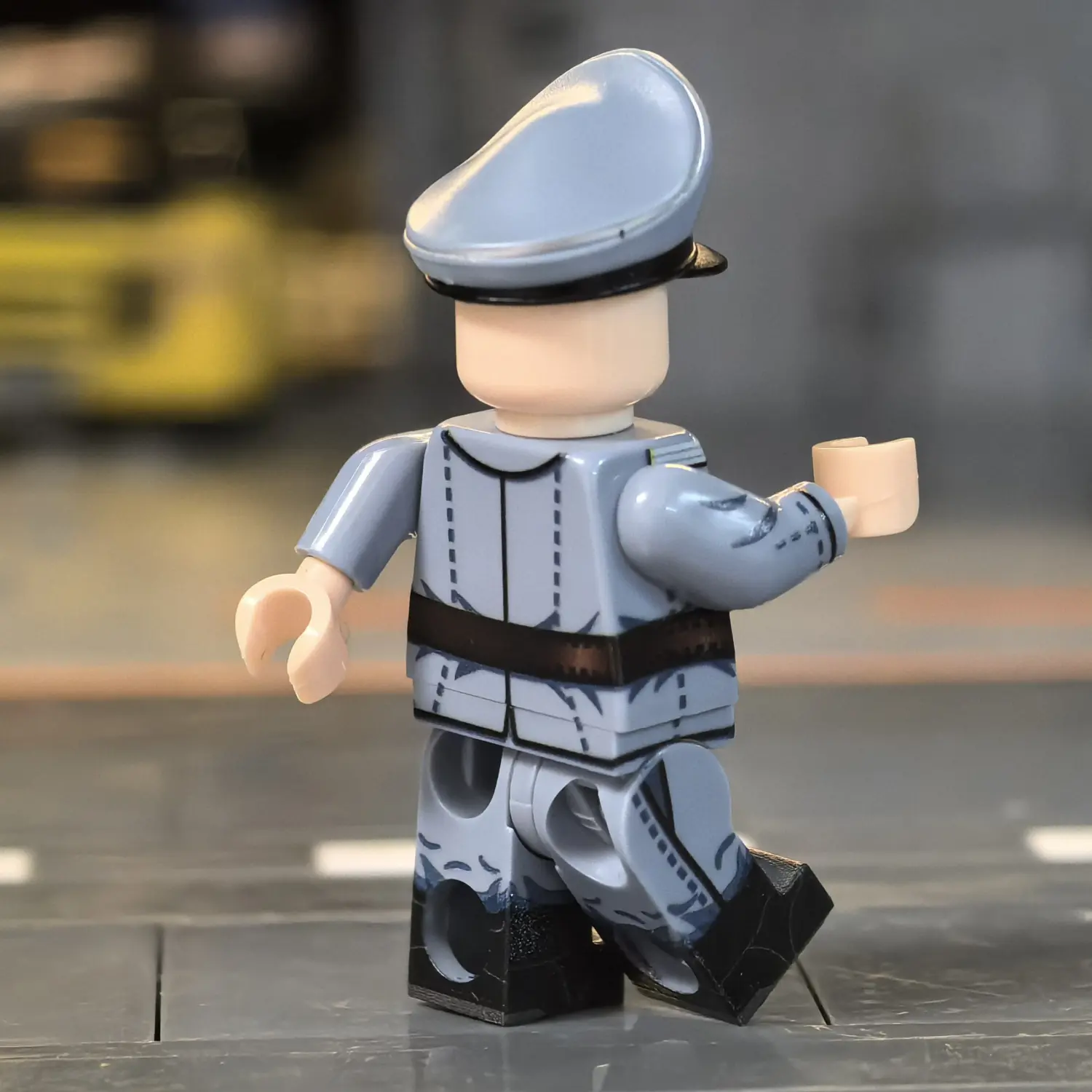 the right back side of the Minifigure - Willi Herold (The Executioner of Emsland) (LEGO Compatible)