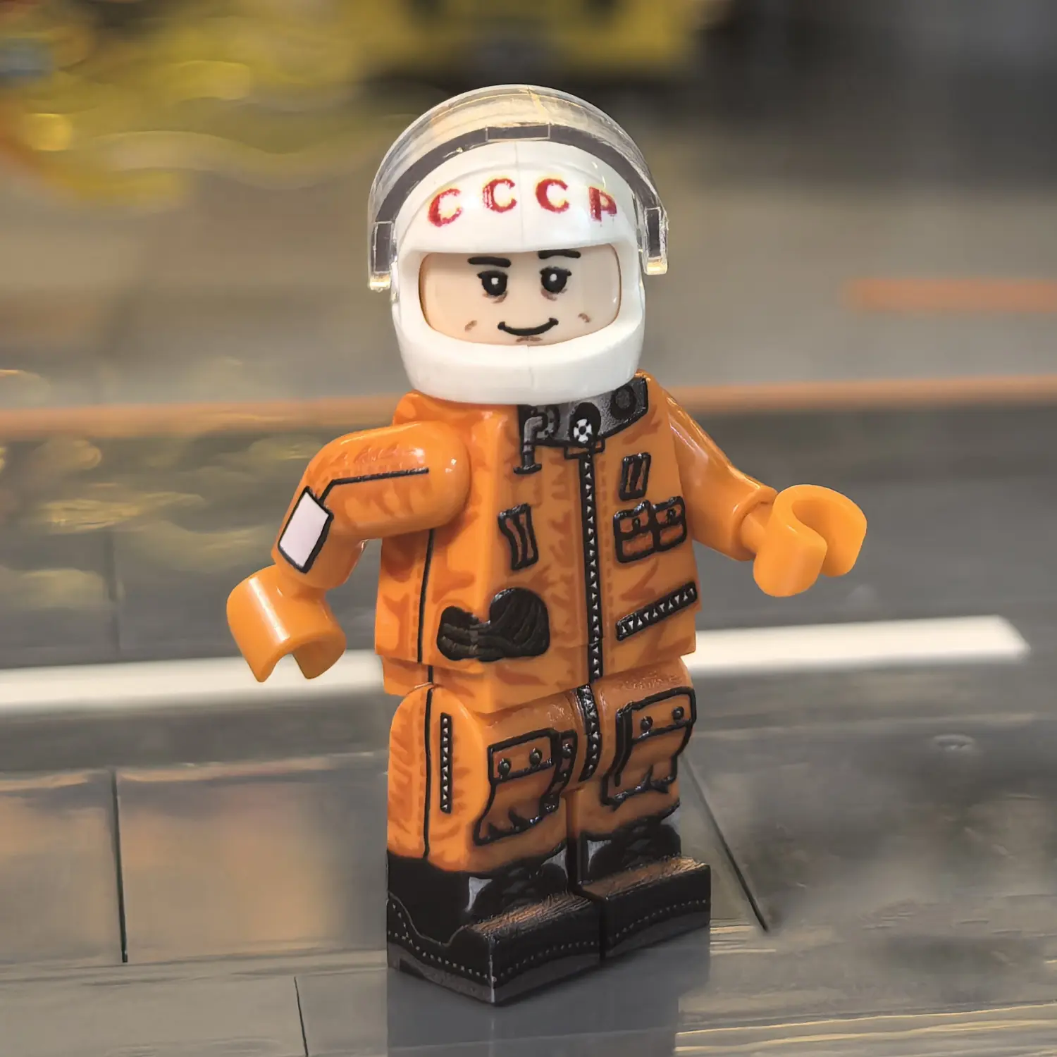 the right side of the Minifigure – Yuri Gagarin (Soviet Cosmonaut) (The First Human in Space) (LEGO Compatible)