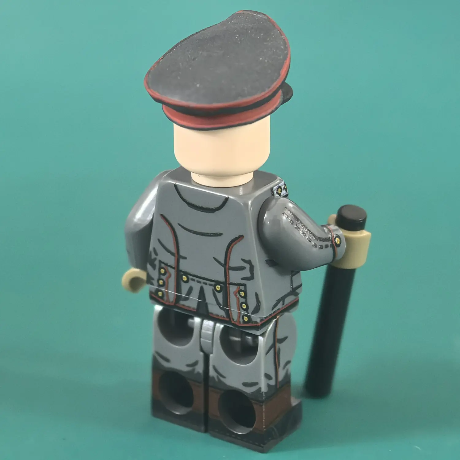 the back of the Minifigure - Manfred von Richthofen (The Red Baron Der Rote Baron) the most famous fighter pilot of WWI (LEGO Compatible)