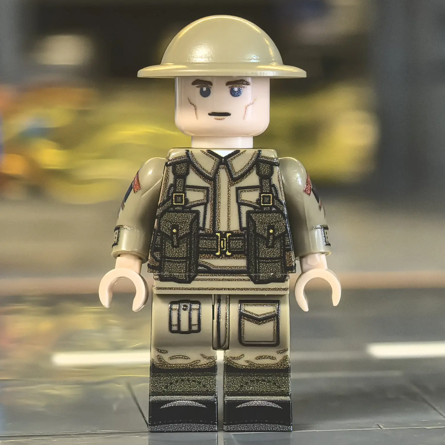 the front of the Minifigure - British Army Infantryman (The Tommy – Pattern 37 Battle Dress) WWII (LEGO Compatible)