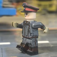the left side of the Minifigure - Manfred von Richthofen (The Red Baron Der Rote Baron) the most famous fighter pilot of WWI (LEGO Compatible)