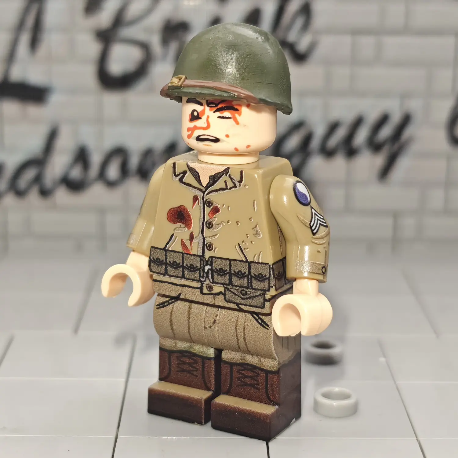 Minifigure – U.S. Army Battle Casualty (Wounded Sergeant) WWII (LEGO Compatible) Minifigure – U.S. Army Battle Casualty (Wounded Sergeant) WWII (LEGO Compatible)